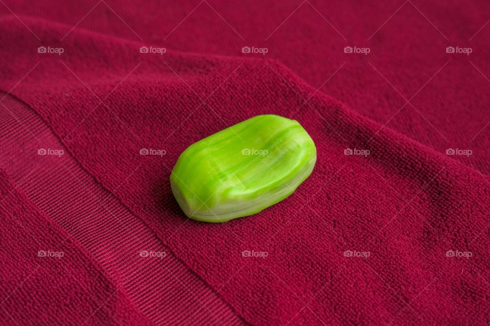 A towel and a soap ready for a quick bath!