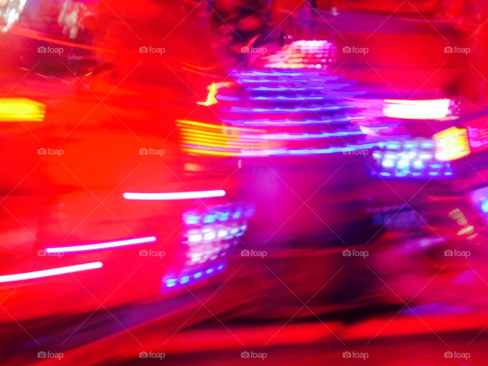 Red fast fairground ride lights