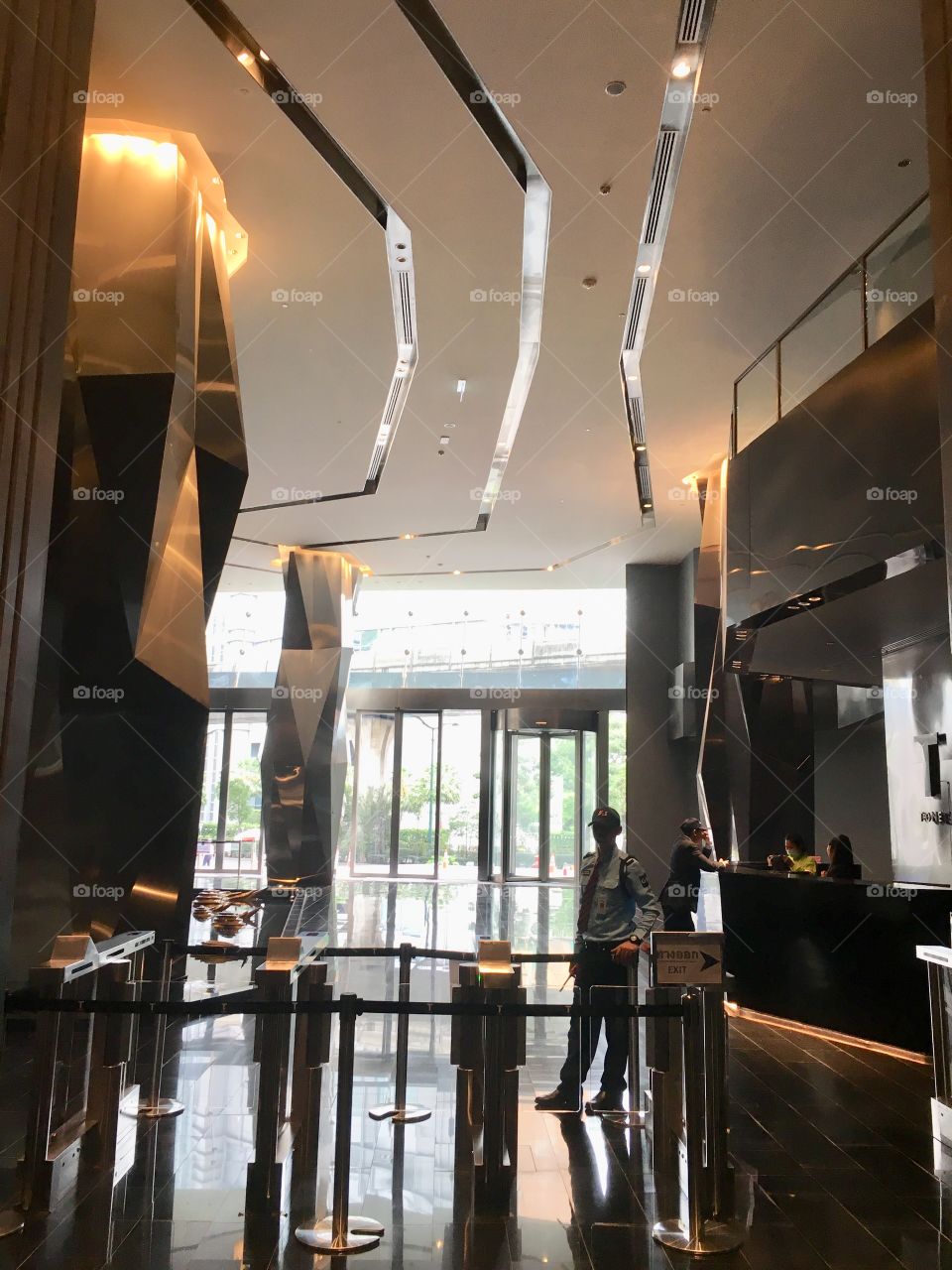 Stainless rose gold column in lobby