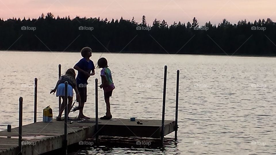 kids on dock. Northern Wisconsin fishing