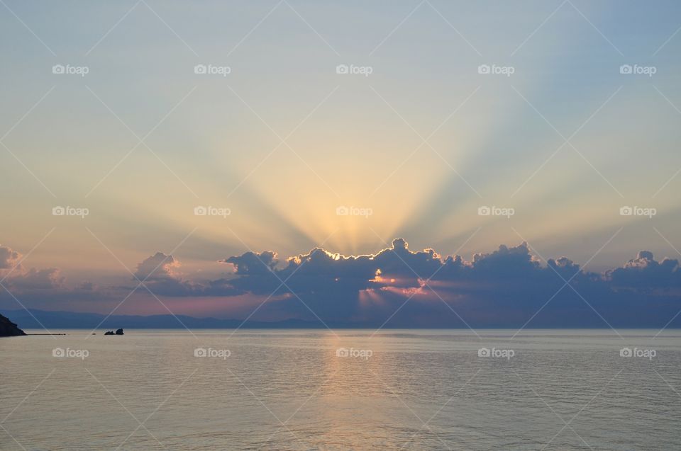 sunrays during sunrise over the black sea in Ukraine