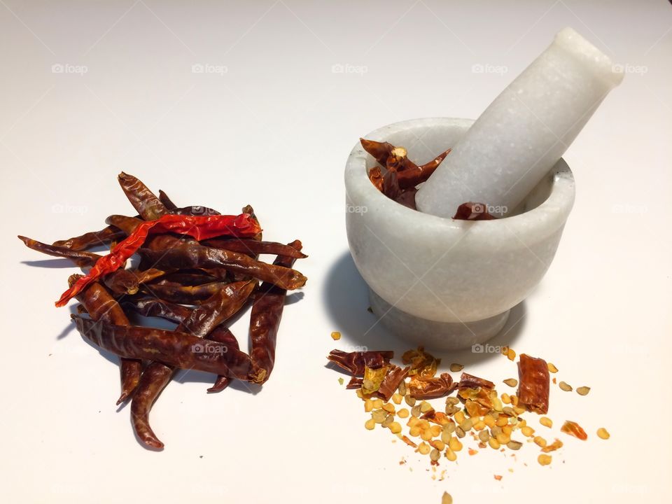 Dry red chillies in pestle 