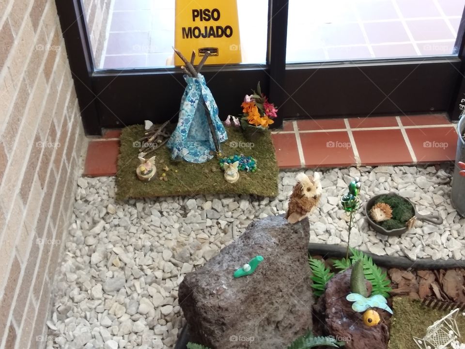 The fairy and gnome garden at the drs office.