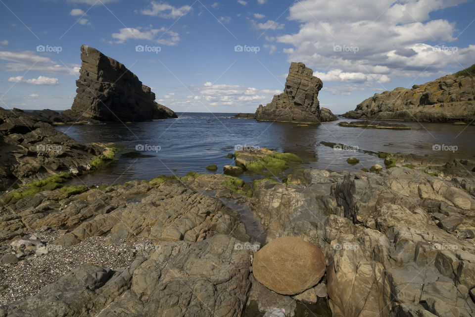 Two rocks in a bay