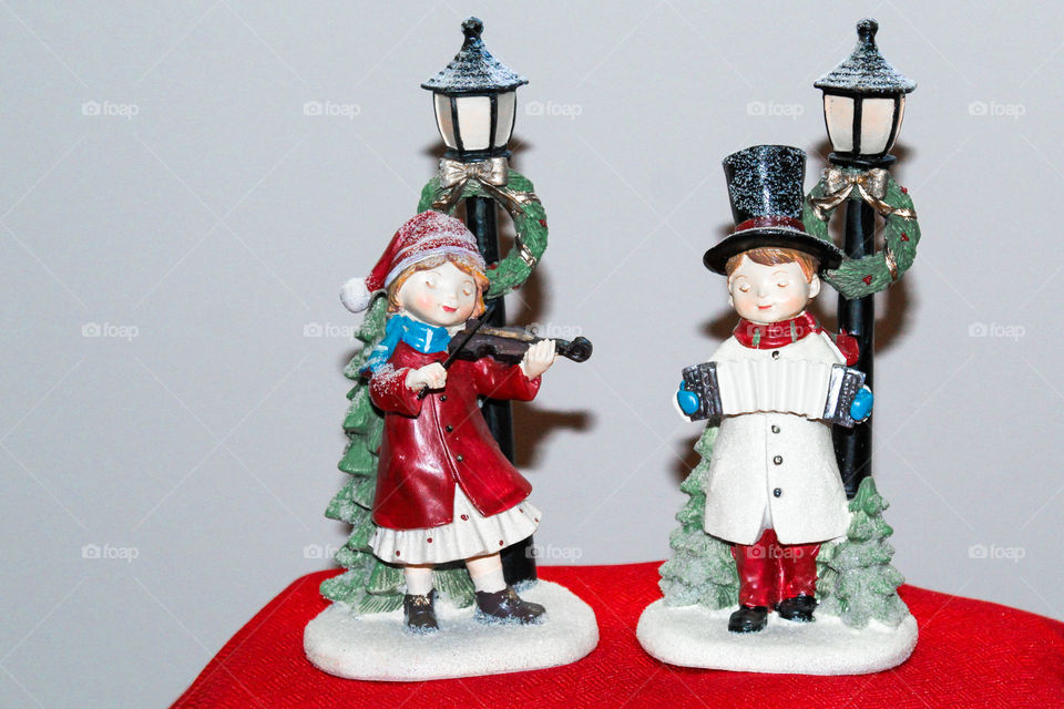Nostalgic ceramic Christmas figurines on display. 