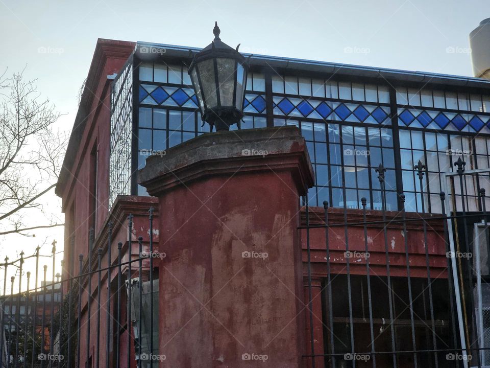 magnificent old building with colored glass enclosure