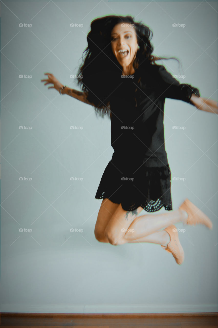 young woman jumping