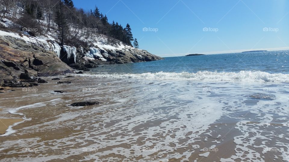 waves retreating from Sand Beach in Acadia National Park