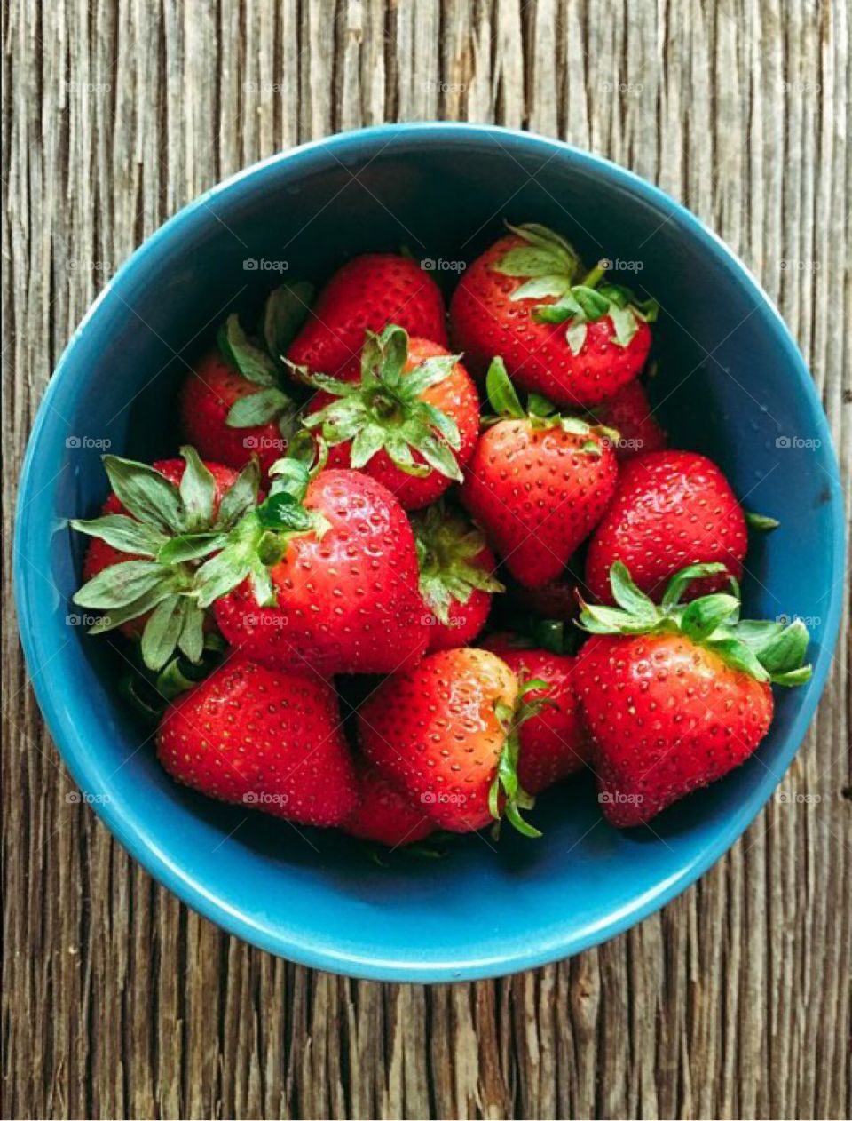 Strawberries in blue bowl