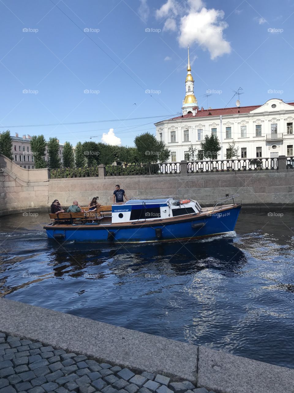 The majestic center of St. Petersburg, the steeple of the bell tower of the St. Nicholas Naval Cathedral is seen ⛪ Embankment of the Griboedov Canal, St. Petersburg, Russia🇷🇺