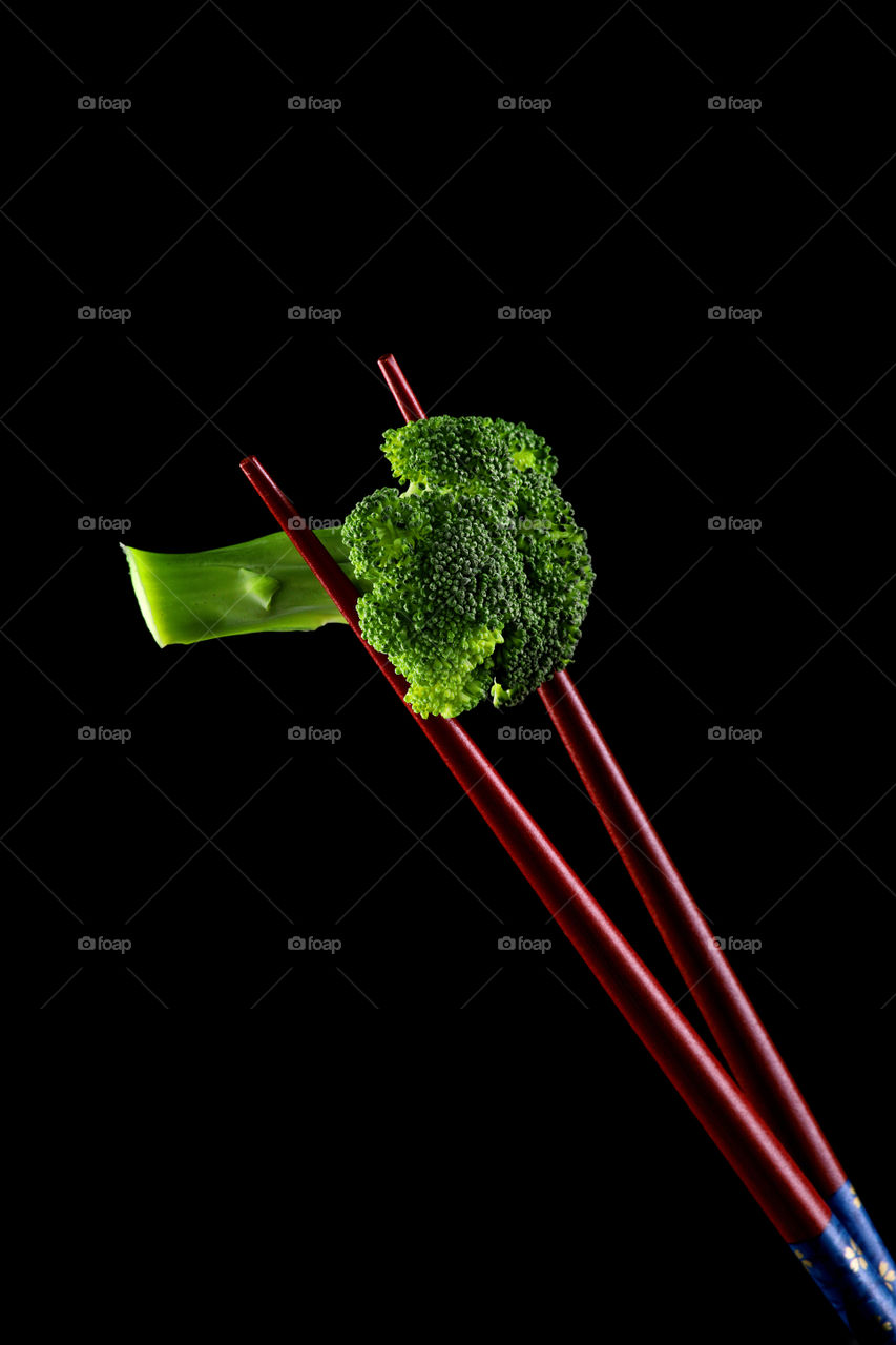 healthy snack - a broccoli on a chopstick