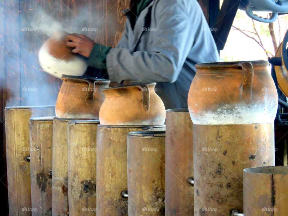 Roasting chestnuts at Christmas market