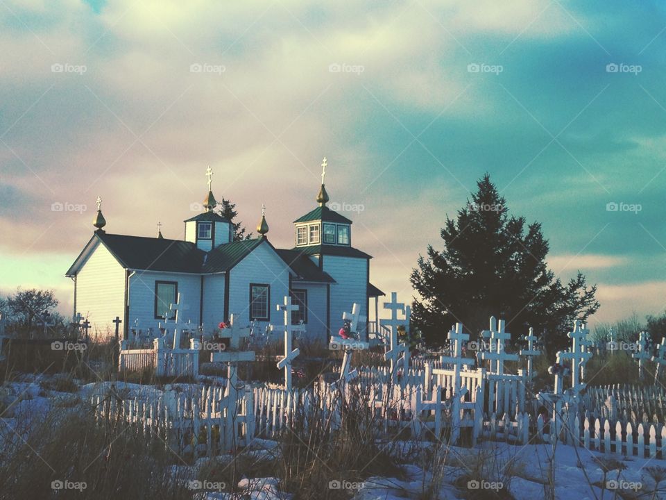 An old Orthodox church is empty and appears still on a winter morning 