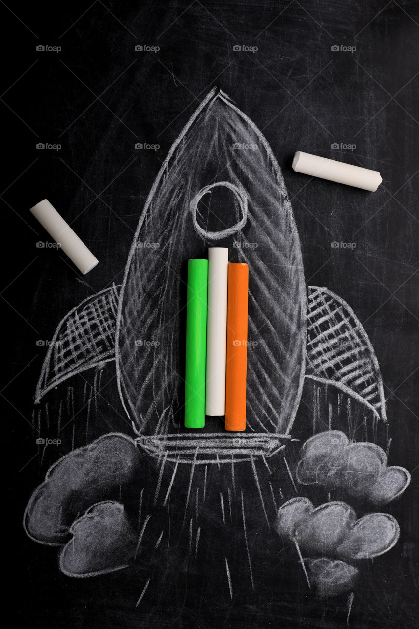 Education takes you places. Achievements through education. Indian flag colors chalk and rocket. India on rise.