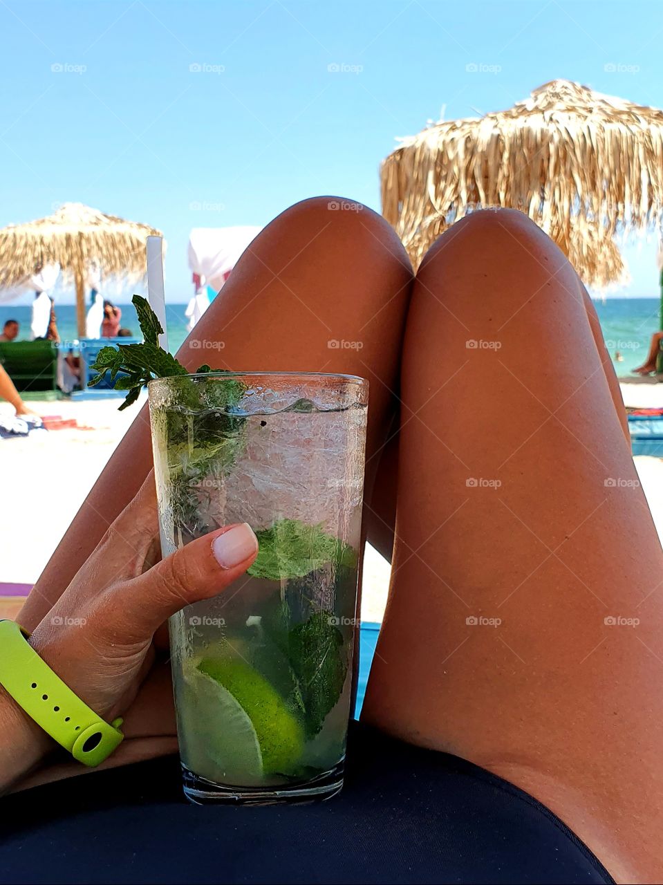 Having a Mojito by the beach