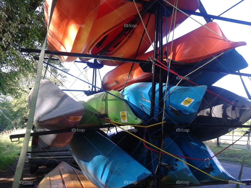 tethers. Kayaks ready to be taken down for a trip on the creek