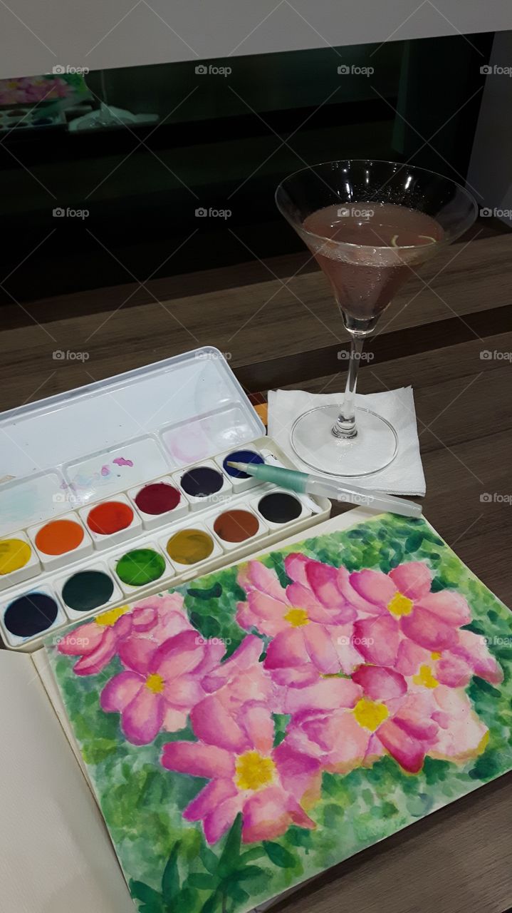 cosmopolitan on the side while painting punl flowers