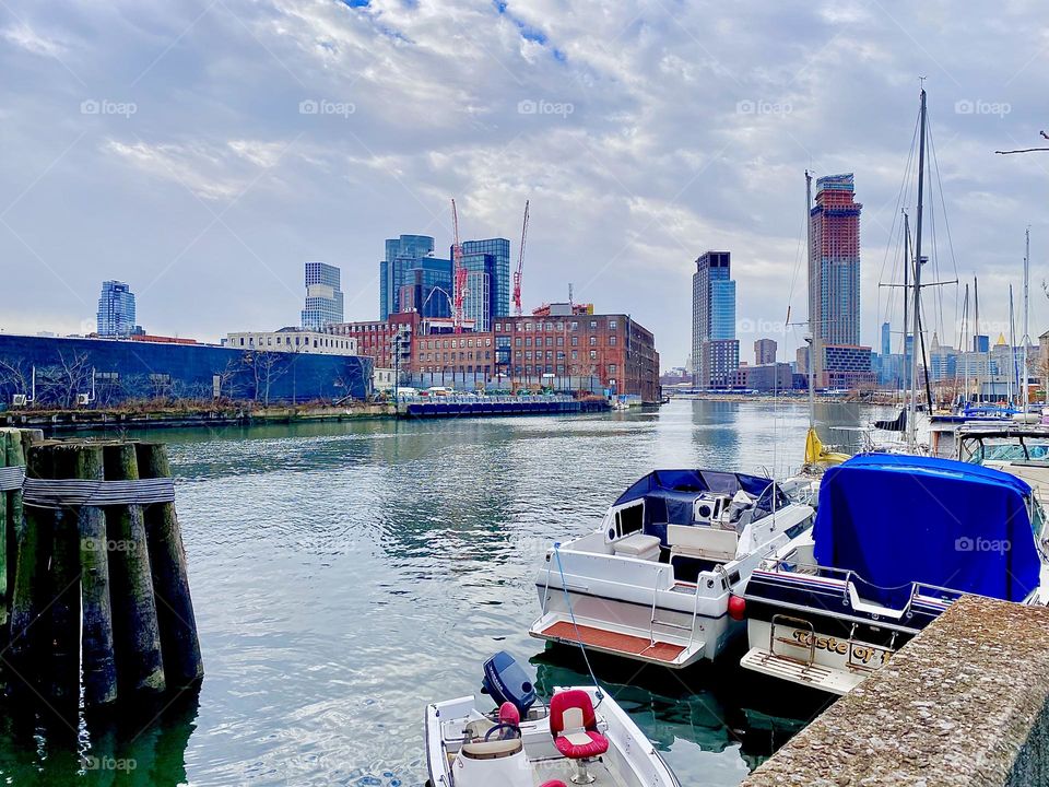 Newtown Creek in Long Island City, Queens, NY is always a wonderful topic to photograph with its many different types of boats and dramatic scenery in the sky reflecting in the waters of the East River below. 2021. Hypnotic Productions