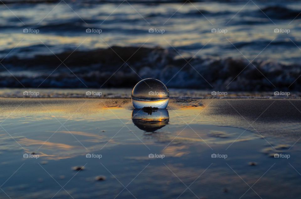 Beautiful and georges Baltic sea sunset through the lensball