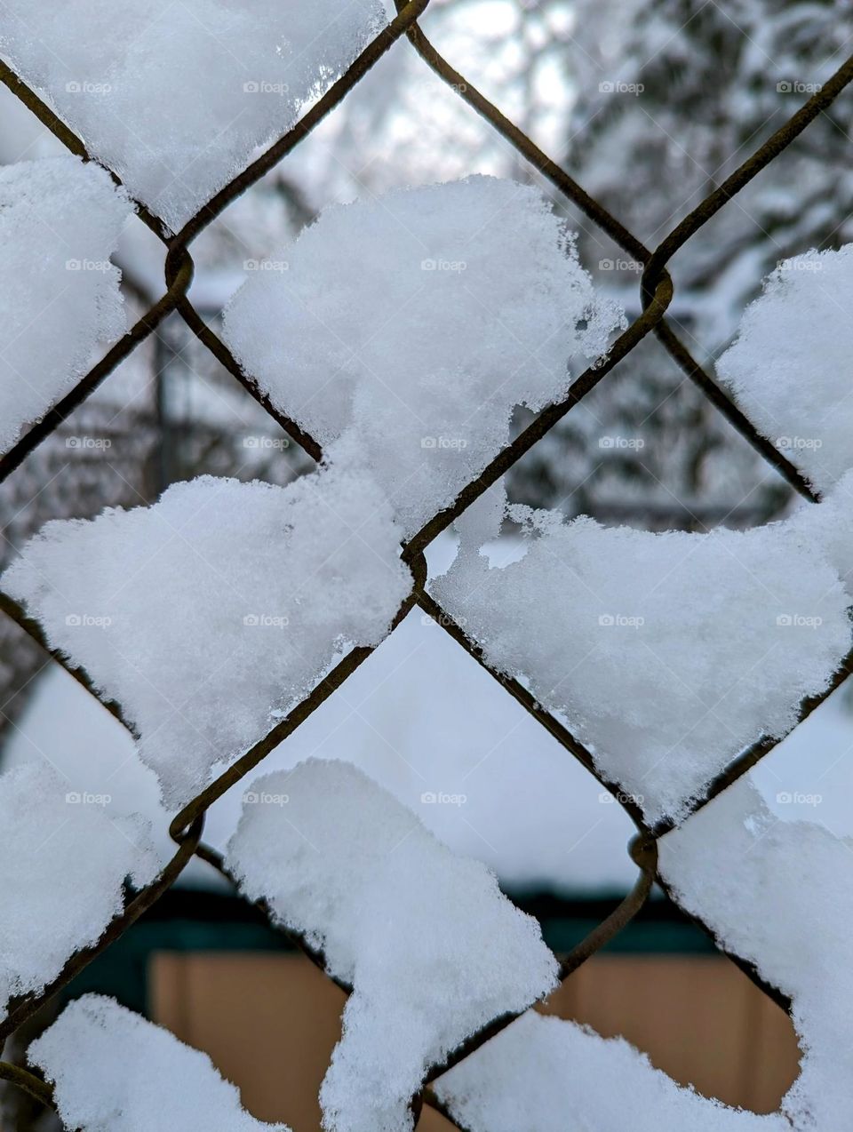 Chain link fence triangles