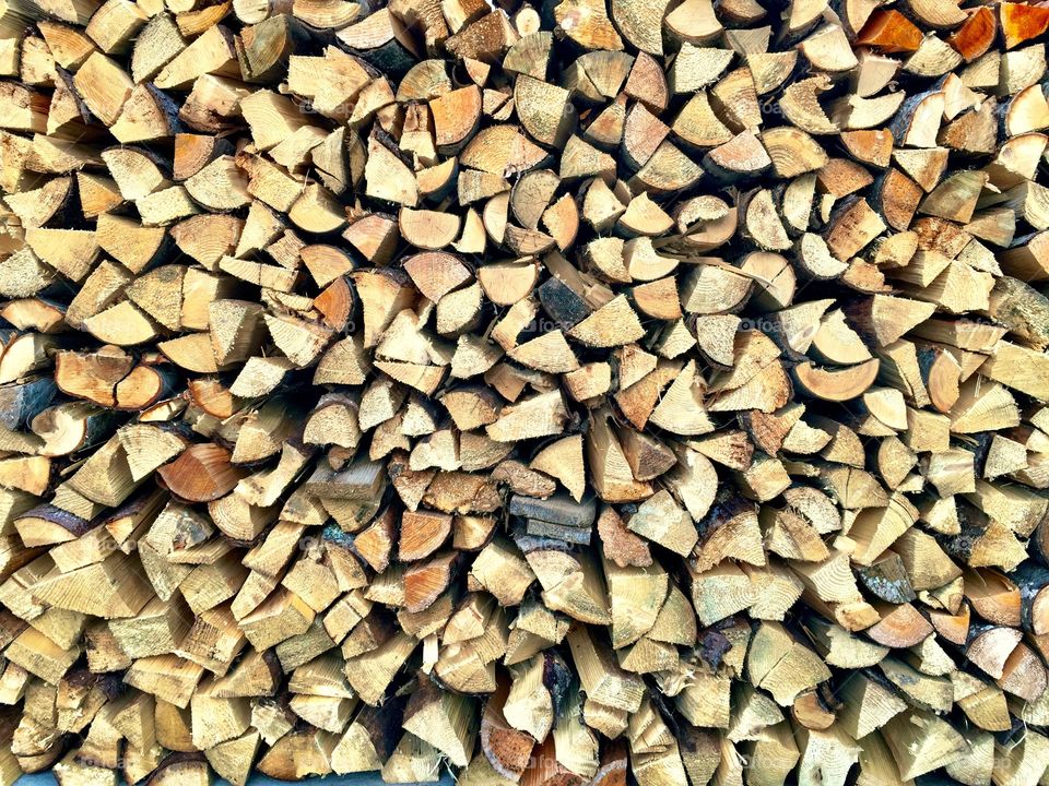 Stack of wood. Pattern of a firewood stack