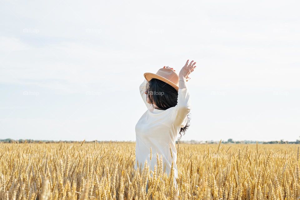 woman dance in wheat field