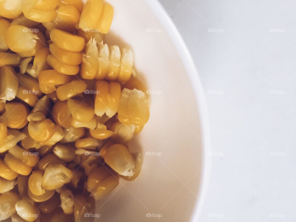 A cup of corn kernels