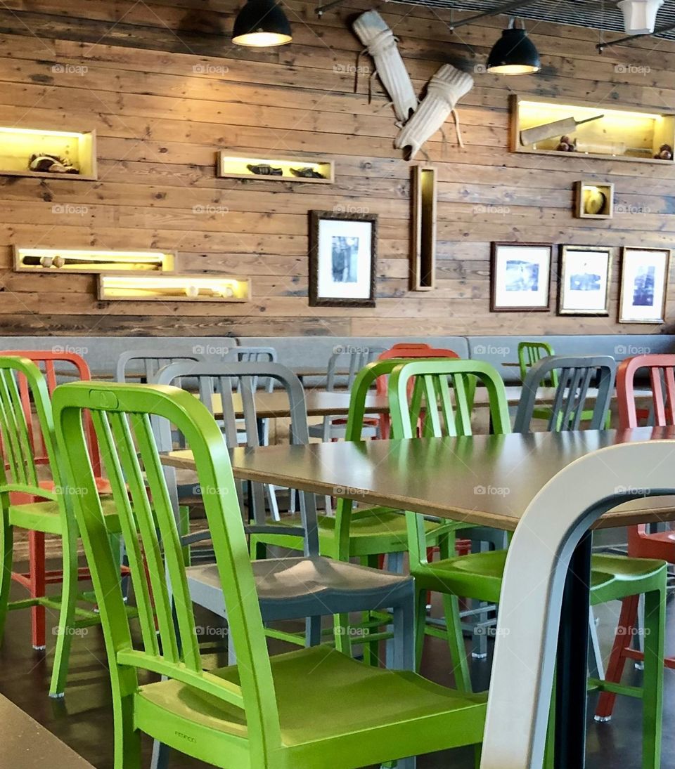 Empty Chairs At Empty Tables