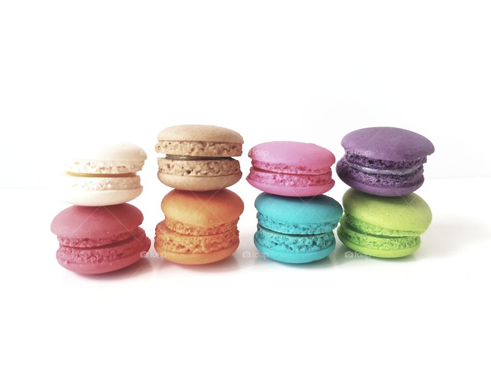 stacked coloured mini macarons high exposure dessert macaroons