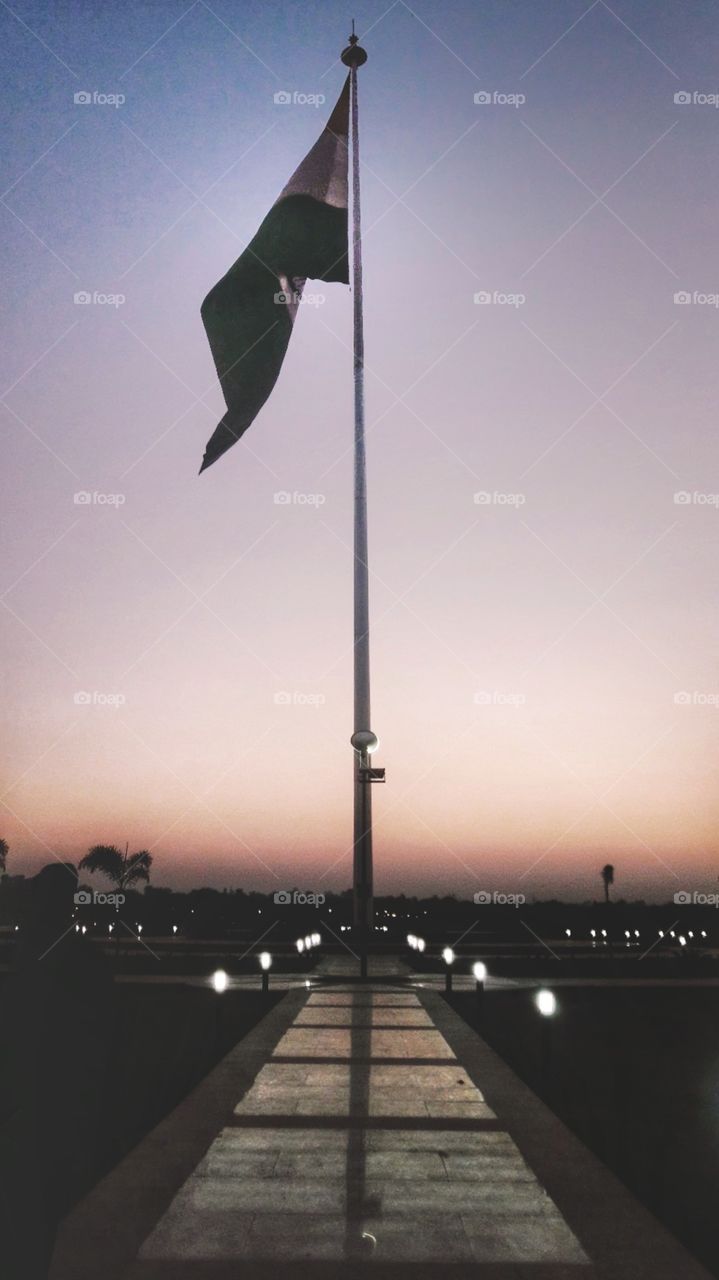 lovely view of flag in evening sunset mood.
