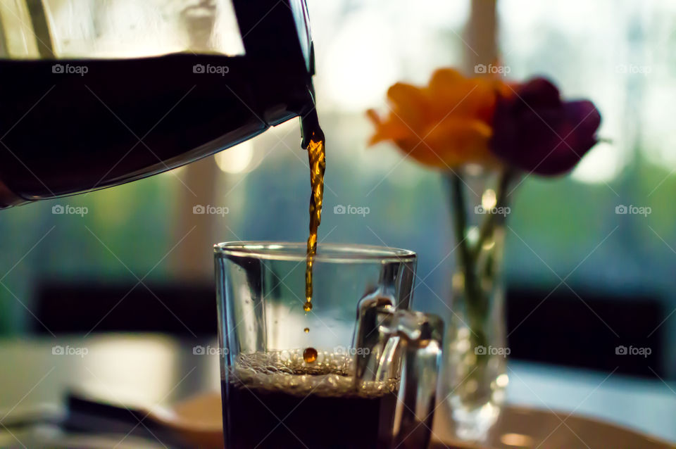 Pouring tea in glass