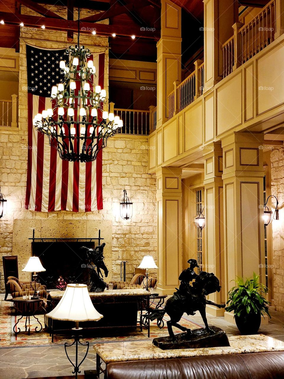A warmly lit beautiful living room provides a patriotic atmosphere and a welcoming space
