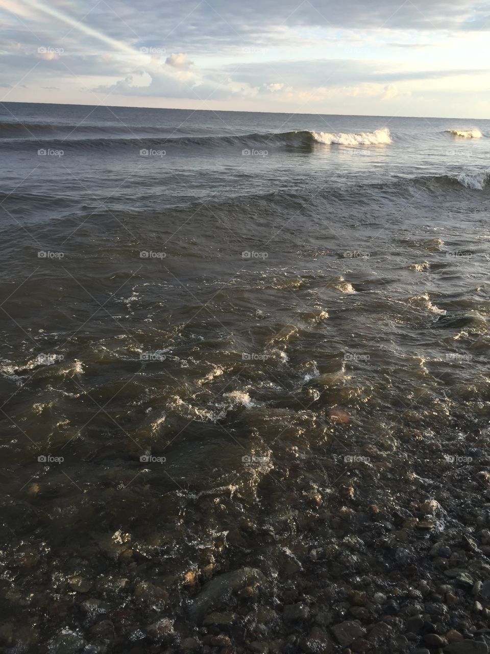 Breaking waves. Early morning waves breaking on the shore.