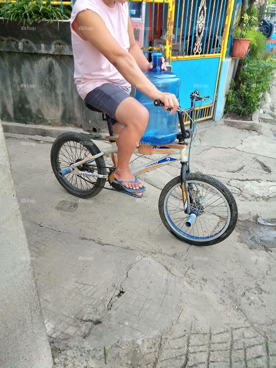 #BICYCLE,, EASY TO USE AS IN THIS PHOTO TO FETCH WATER