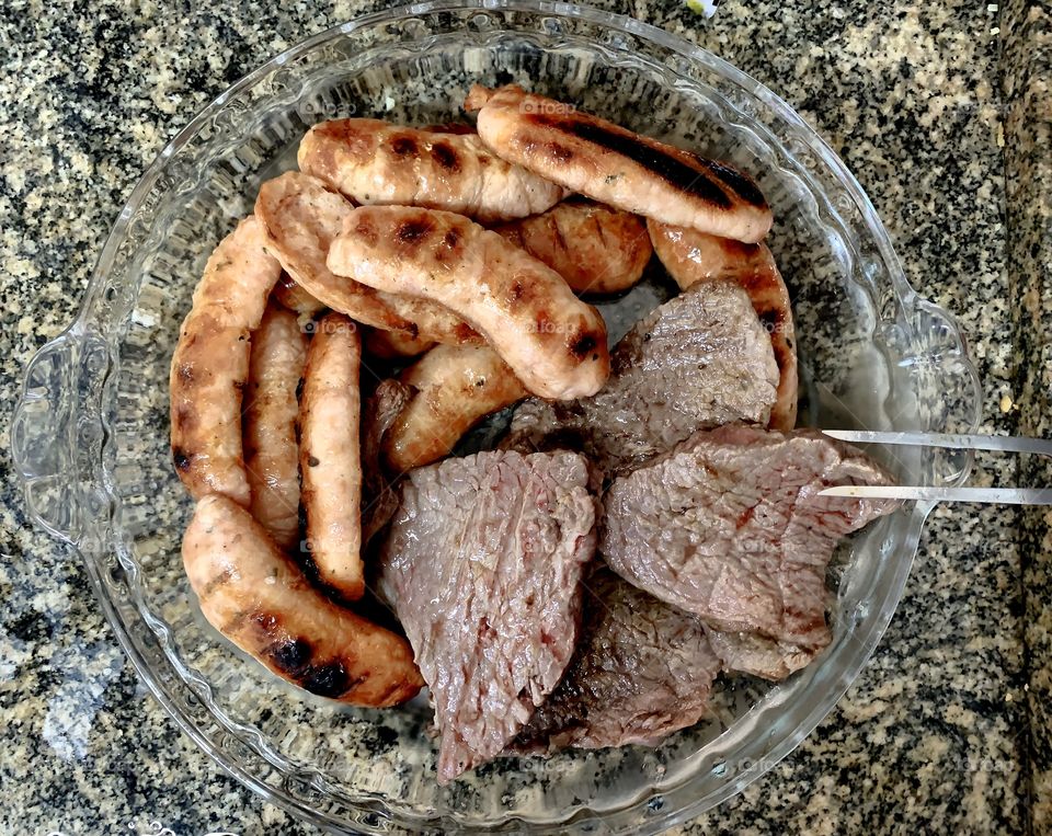 Family barbecue: meat and sausage