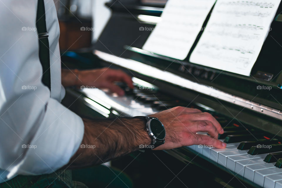 Man playing a piano 