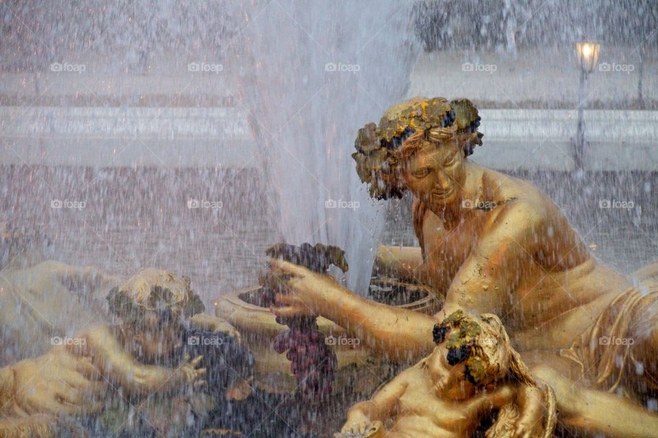 statue of a person in a garden