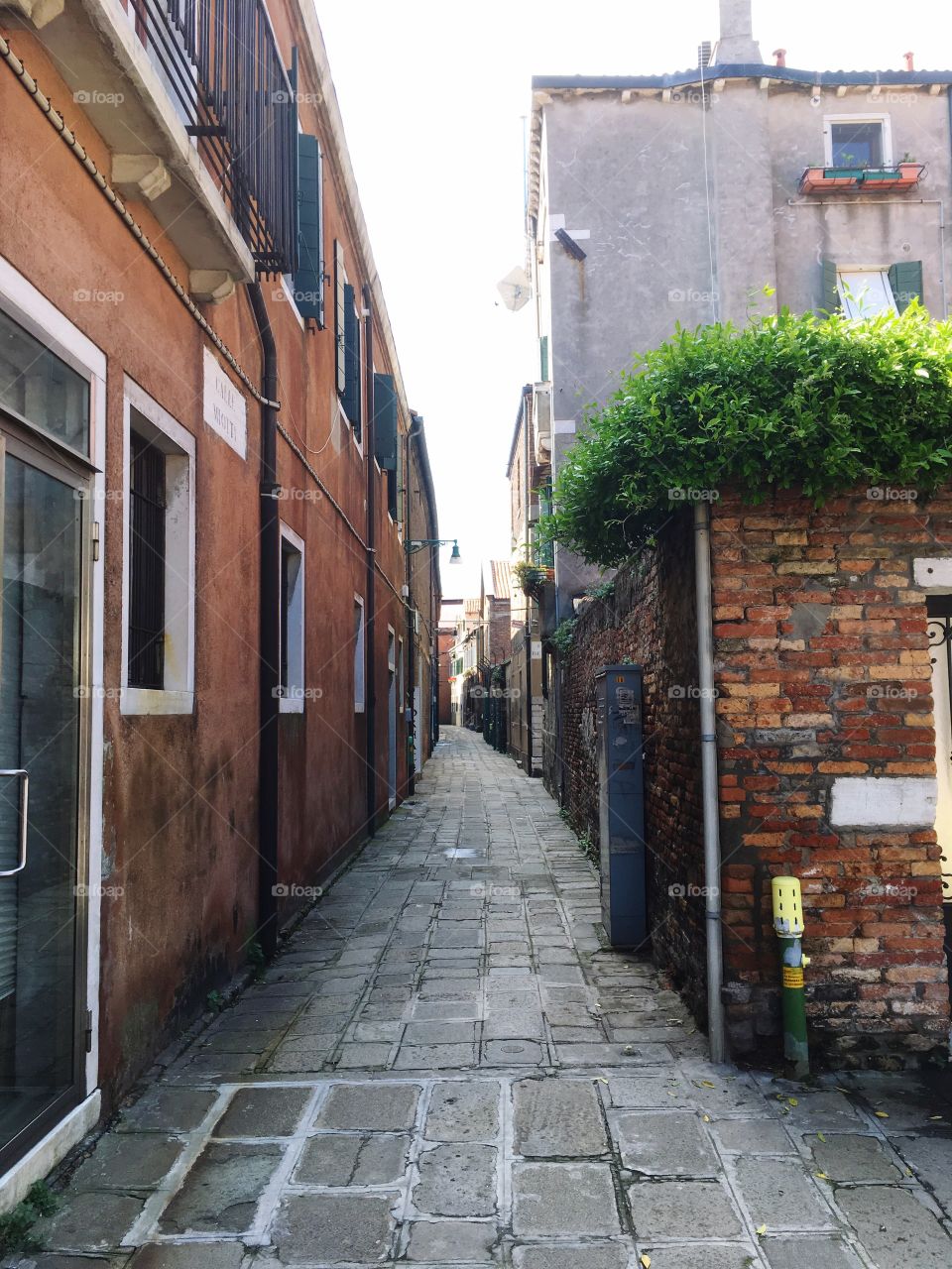 A narrow street in Italy