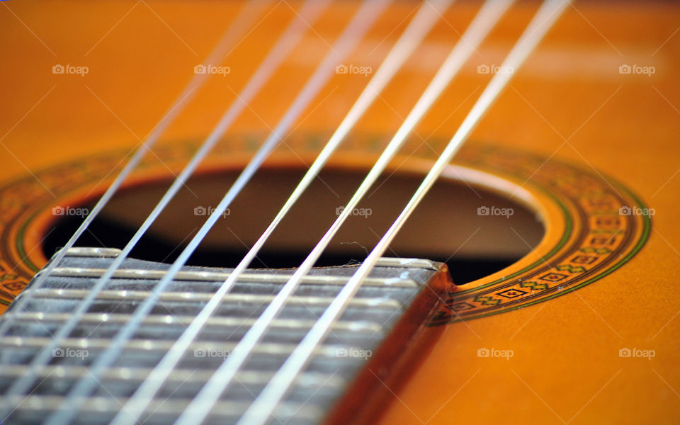 Macro shot, acoustic guitar, string, pickup, detail closeup
