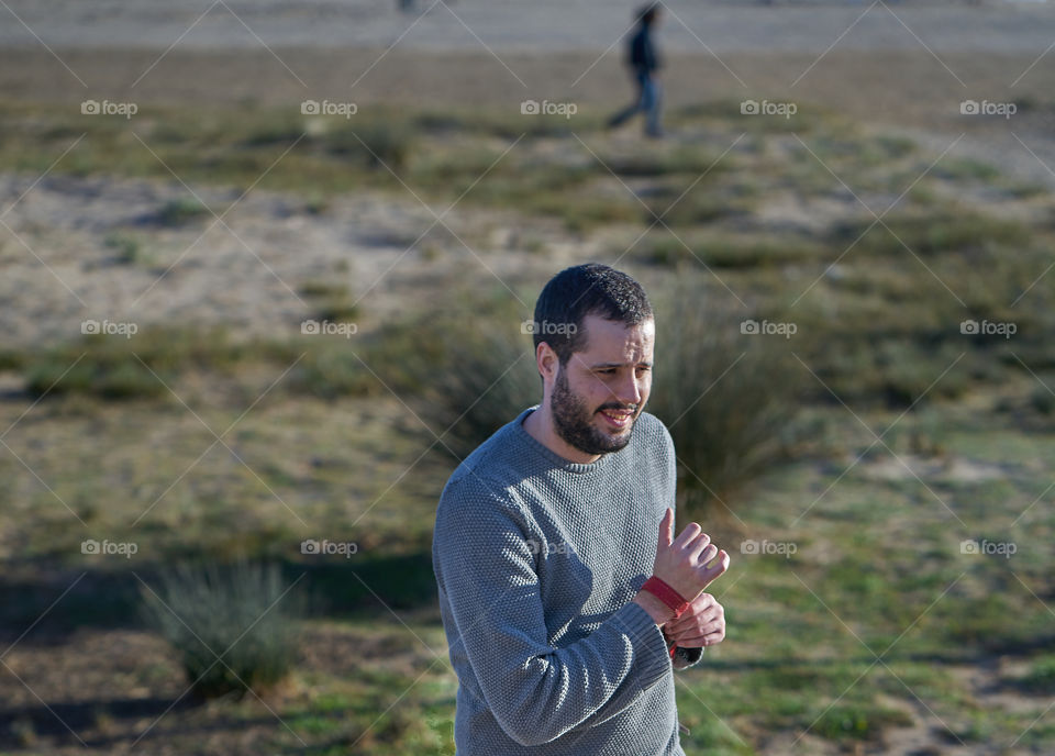 Close-up of a mid adult man walking outdoors