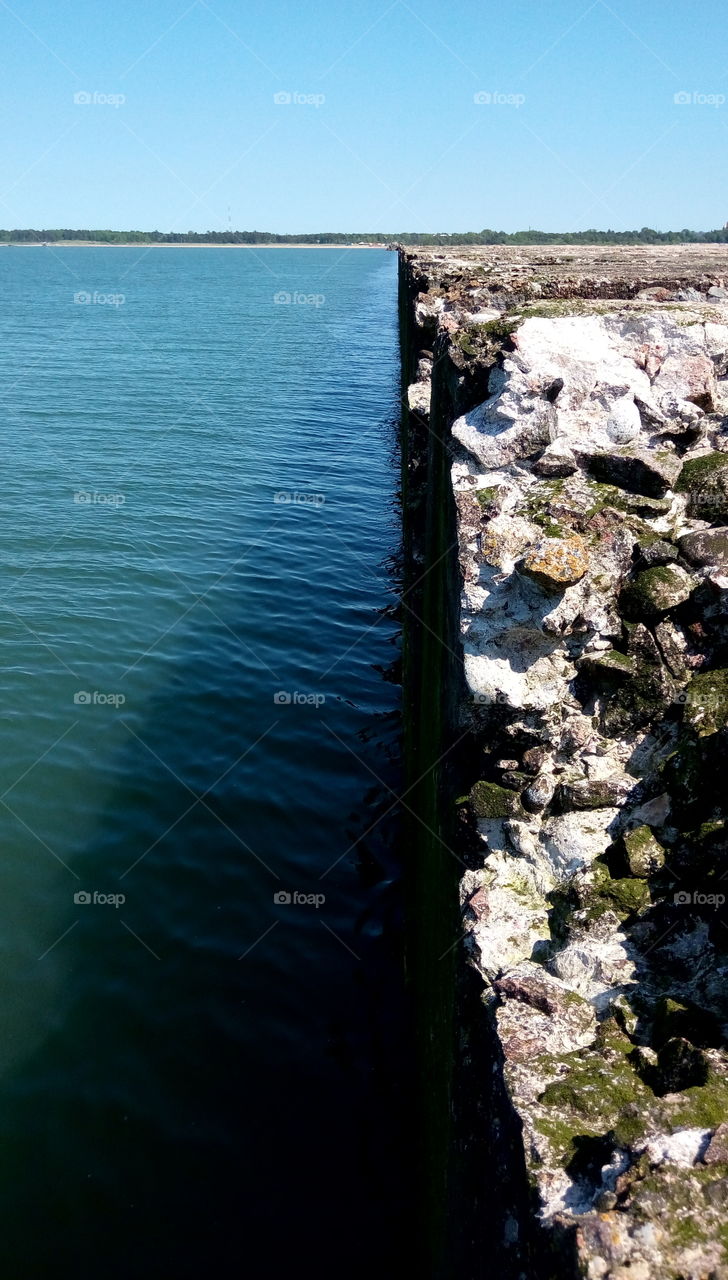 Old ruined pier edge