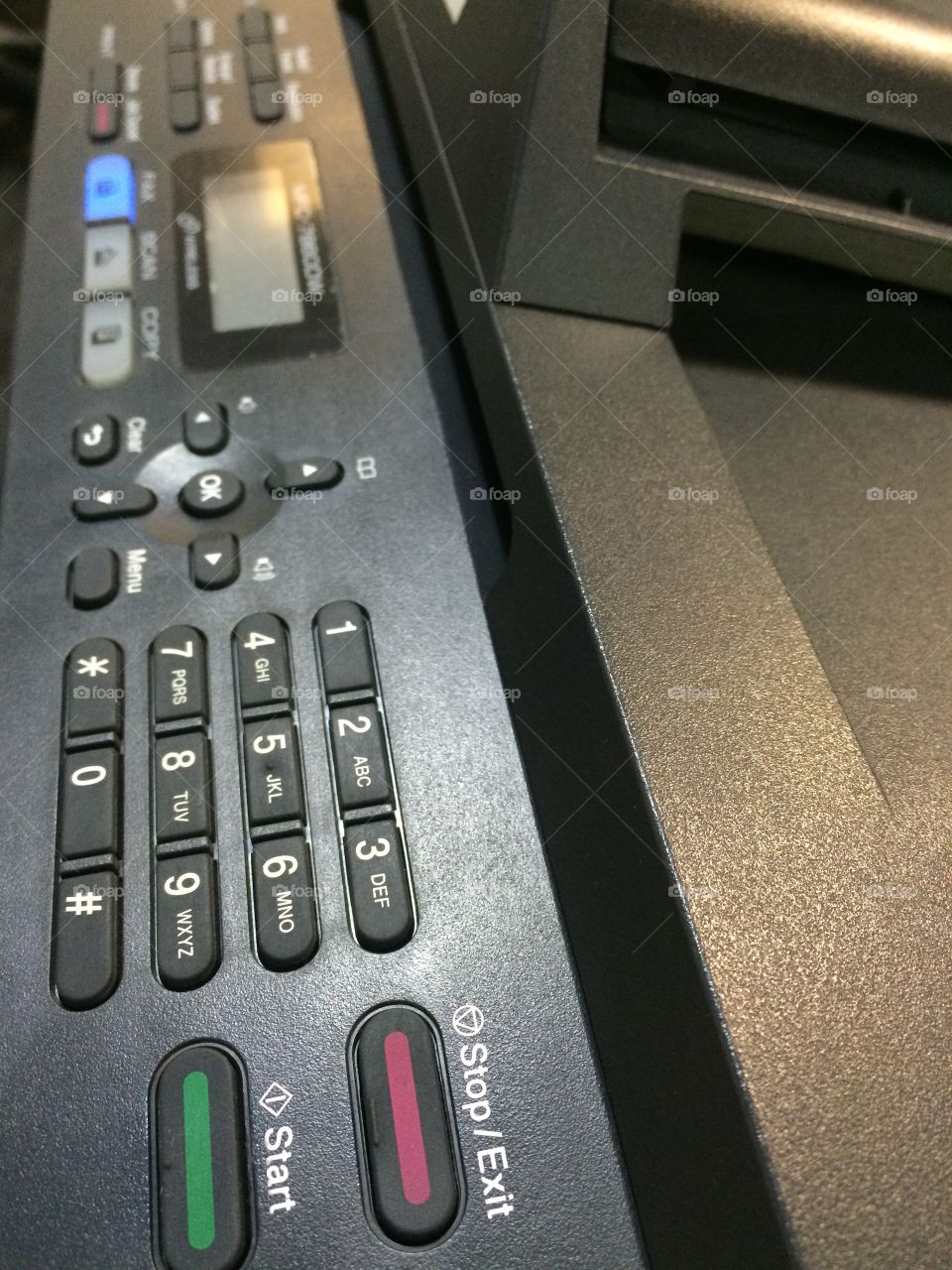 Printer and fax machine buttons closeup