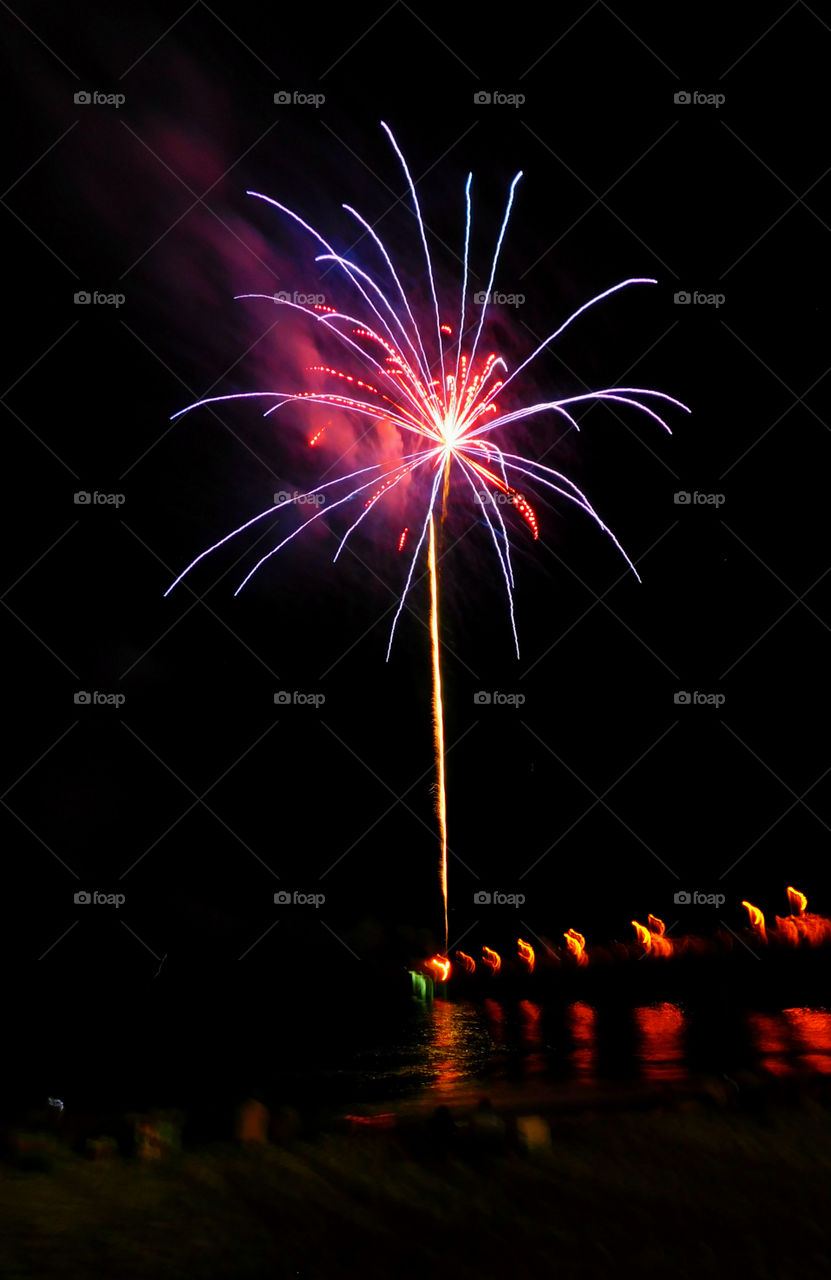 Here, over the Gulf of Mexico, a barrage of missiles designed to explode in a controlled way explode with brilliant red, orange, yellow, green, blue and purple colors! Thousands of people across the United States will be celebrating Independence Day on July 4th by  attending firework displays! 