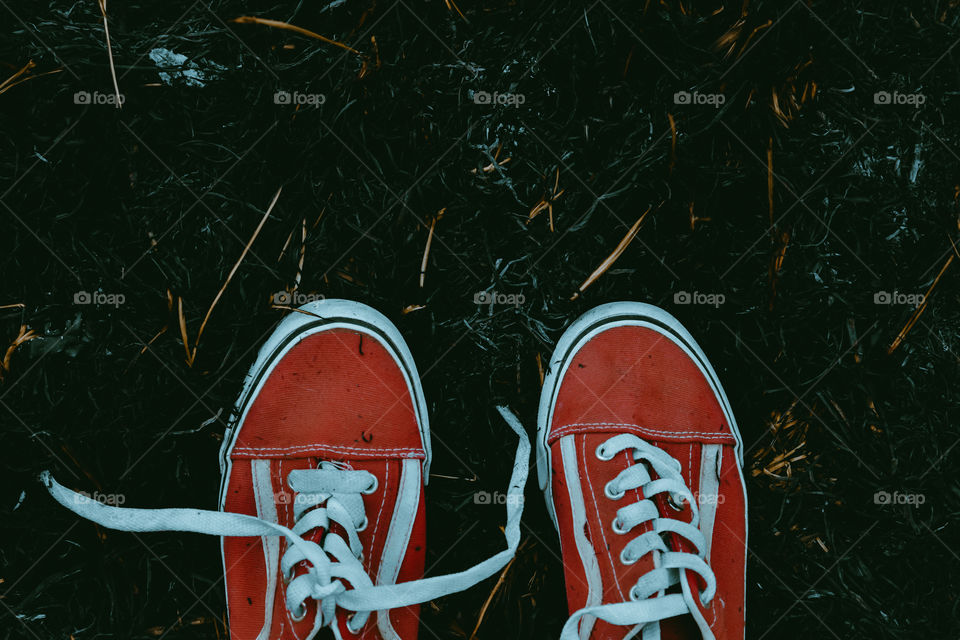red shoes on the burning grass