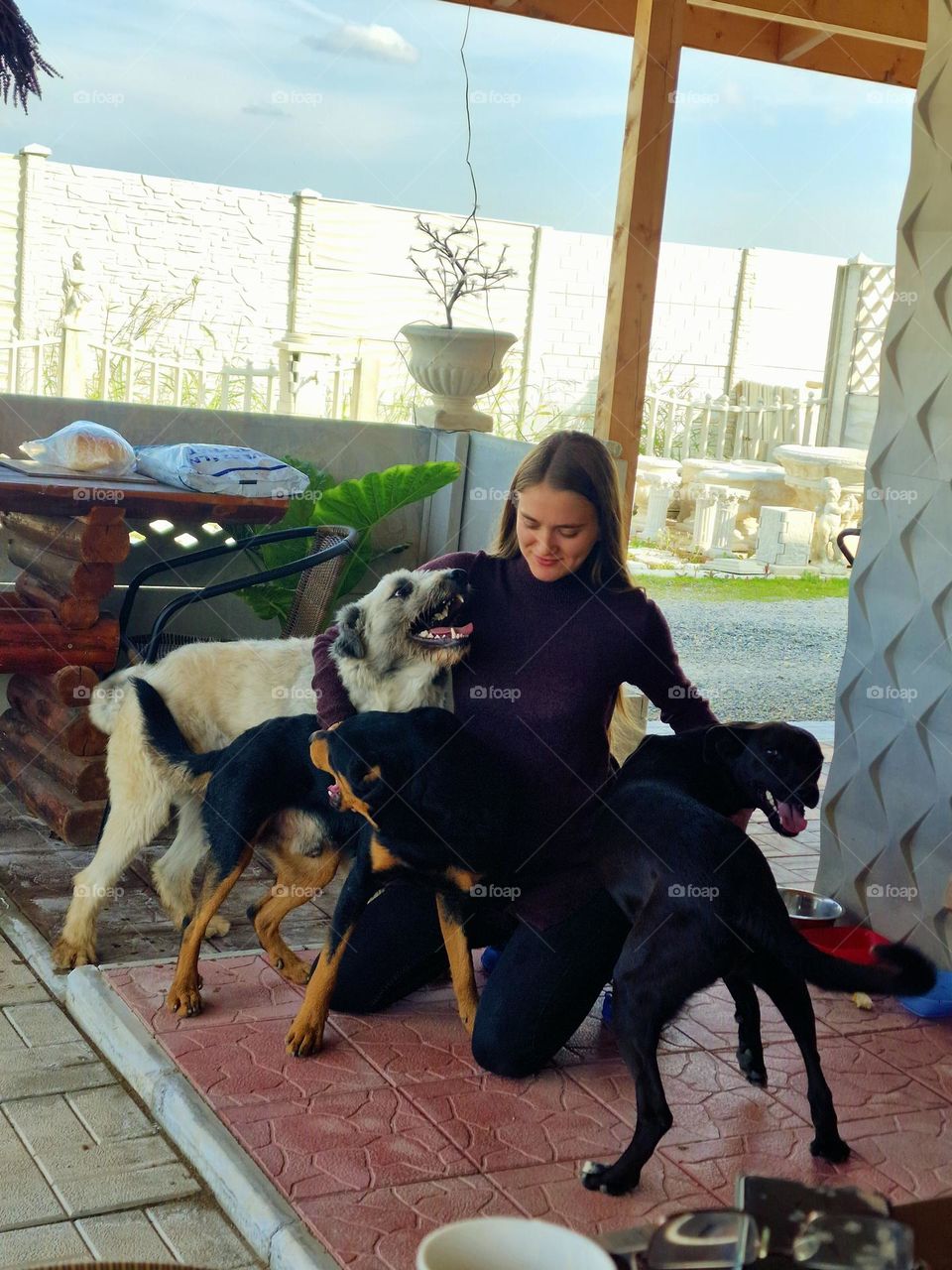 happy with her four-legged friends