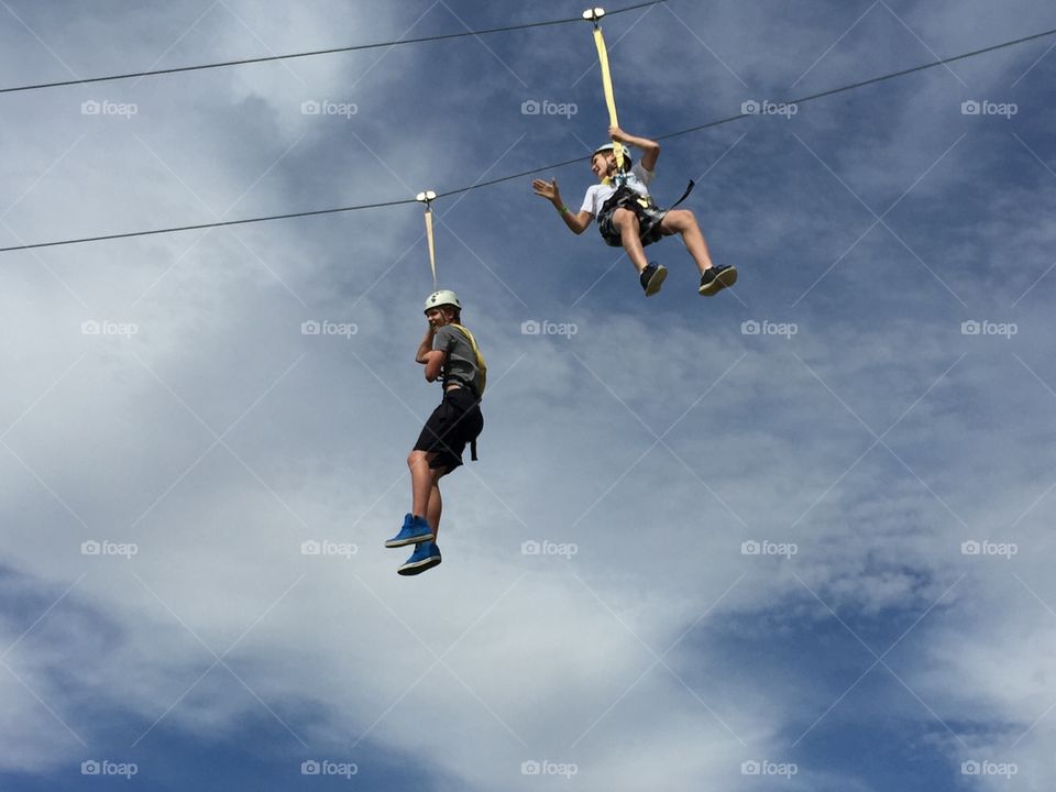Zip line . My son and his friend zip lining 