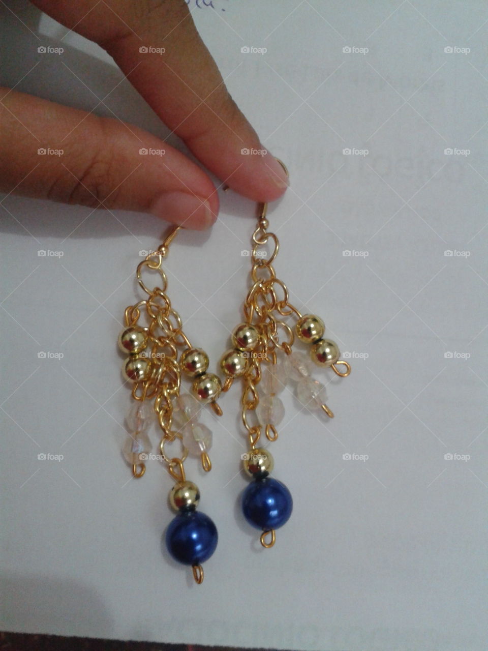 Brincos, bijuterias, douradas com azul