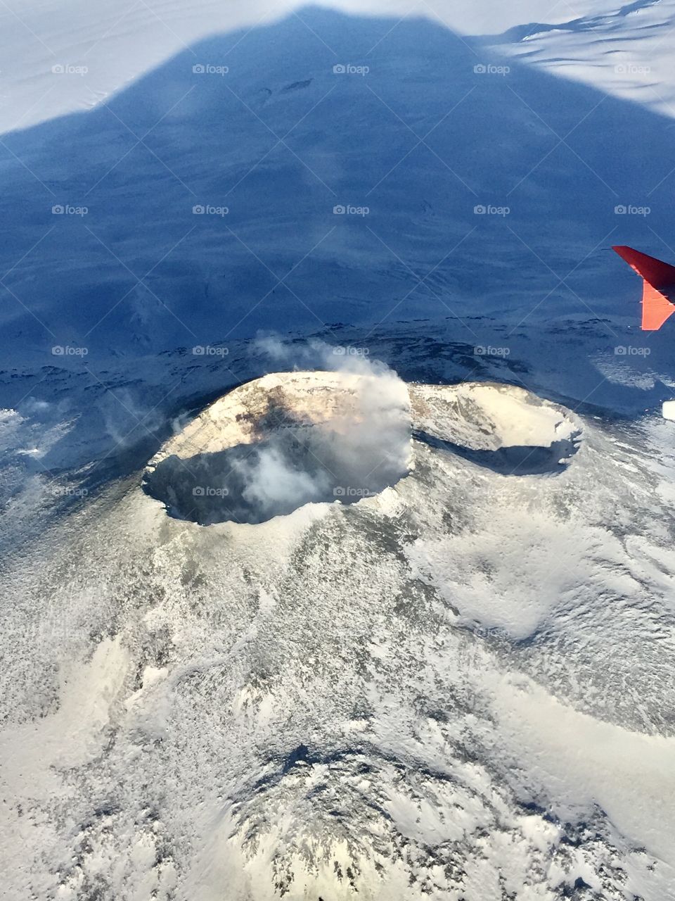 Mount Erebus volcano off-steaming, as seen from Sky Traders Australian A319 Airbus, Ross Island, Antarctica.