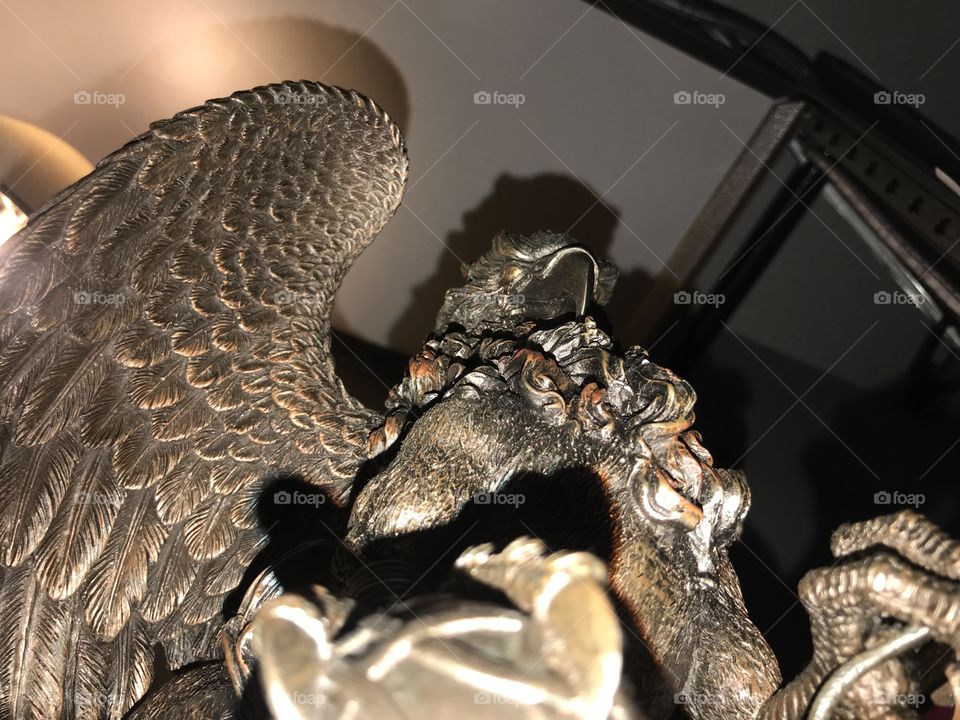 Gryphon statue from below.