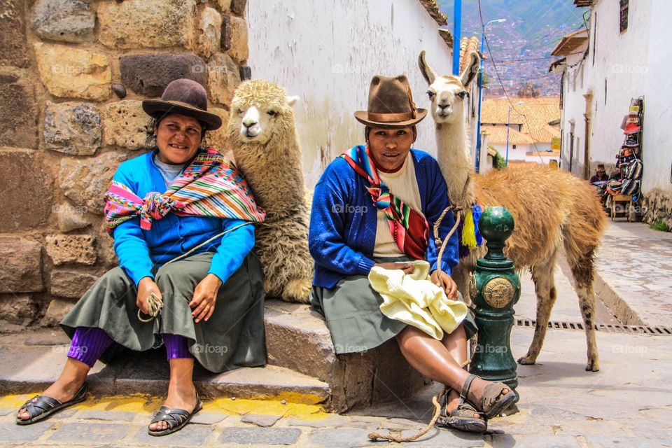 Pets. I came across these women and their llama and alpaca in one of the old streets of Cusco.